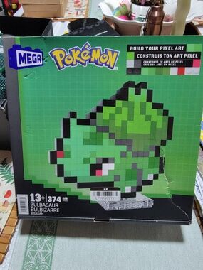 BaubleBar Green and Black Pixel Bulbasaur Display